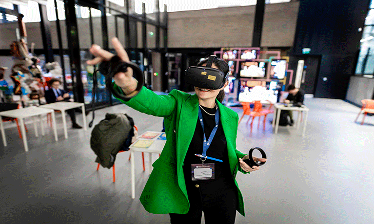 Laura Lecci, CEO of EBN, wearing a VR head set