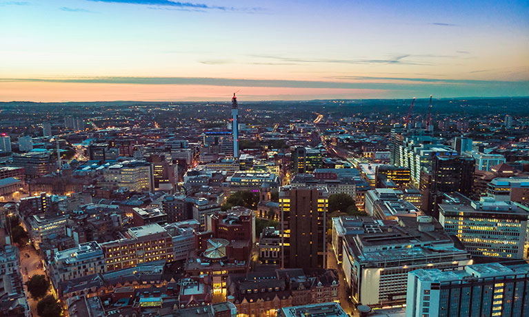 A city skyline at evening time