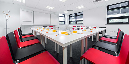 black and red chairs in a meeting room