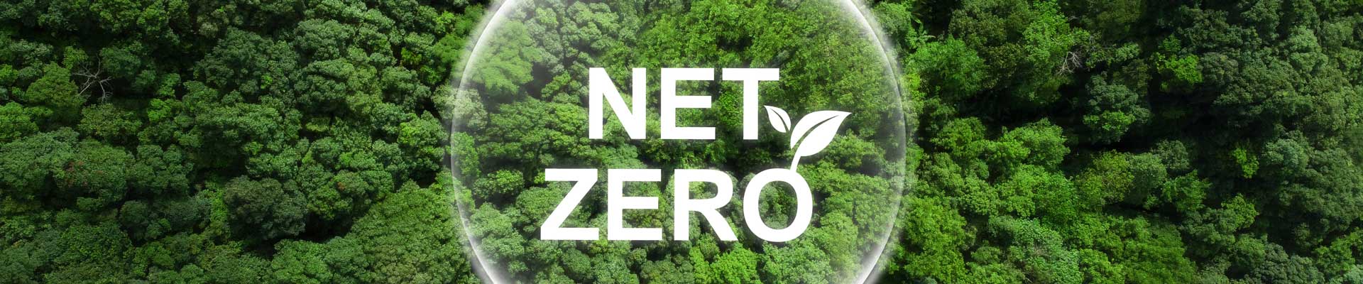 Net zero logo with a leaf coming off the zero, as a bubble floating over green trees