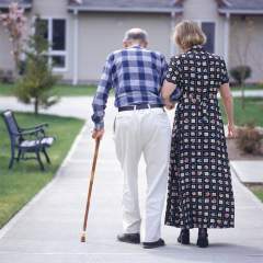 Couple Walking To House