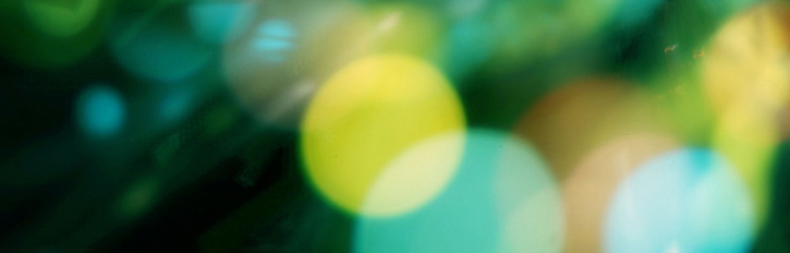 Out of focus yellow and green circles.