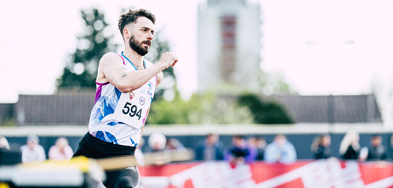 Track and field athlete running in a race