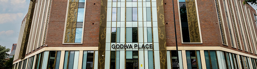 Front of Godiva Place student accommodation block on a cloudy day
