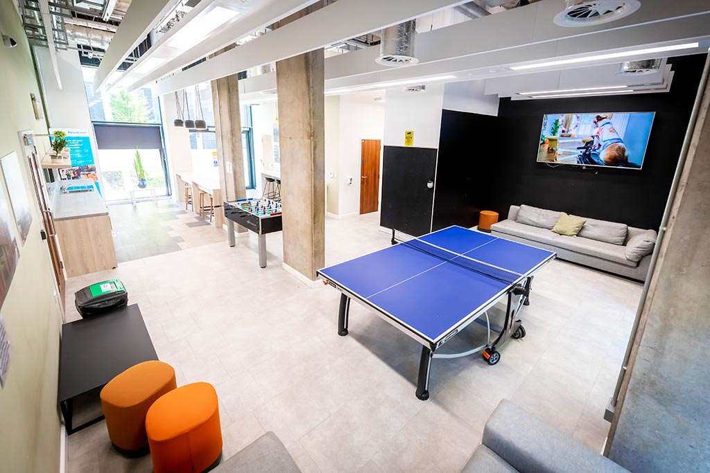 Ping pong table and TV in a communal area
