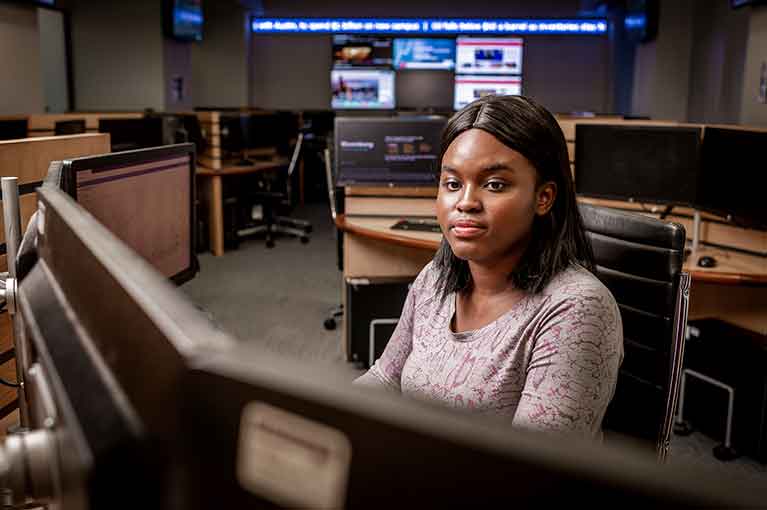 Student working on the trading floor