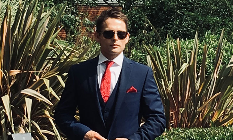 Lewis Herrington in a suit