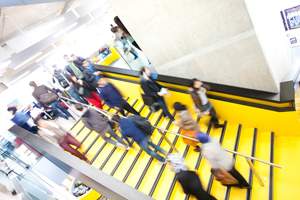 people walking on the student hub stairs