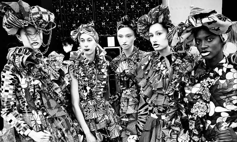 A black and white image of women wearing Hayleigh's designs