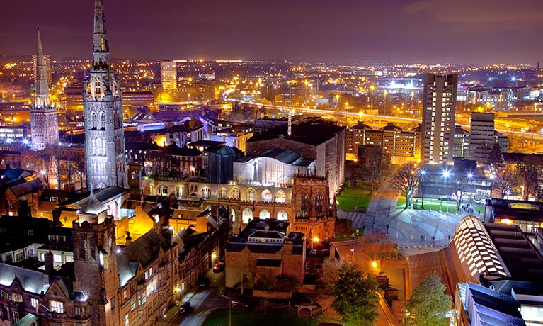 Panoramic view of a city at night