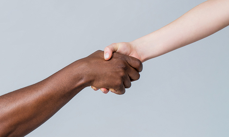 Two people shaking hands