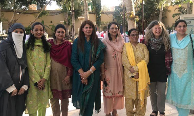 Professor Sarah Whatley with research colleagues in Pakistan