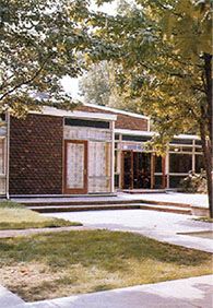 Outside photo of school on sunny day.