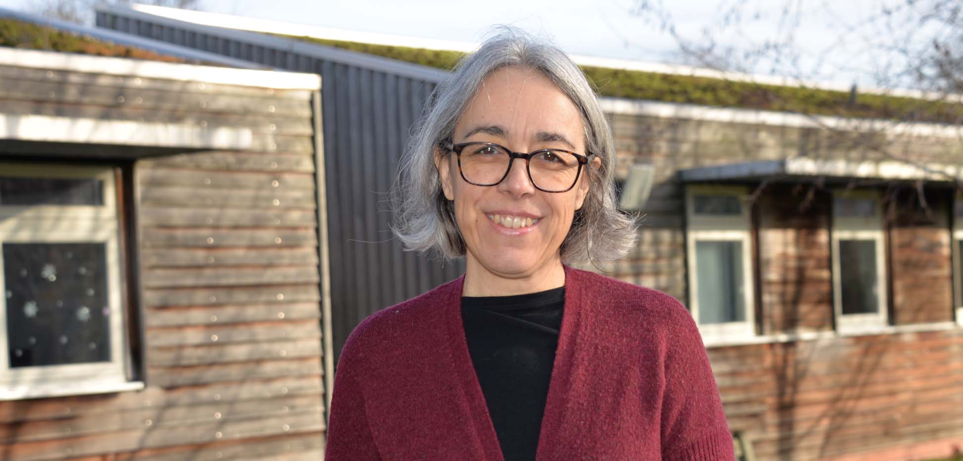 Picture of Moya the centre director in the gardens on site