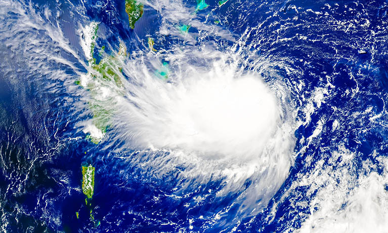 A meteorological view of a storm across sea and islands.