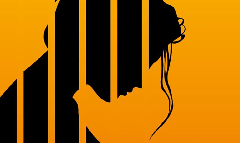 Pregnant woman silhouette behind bars.