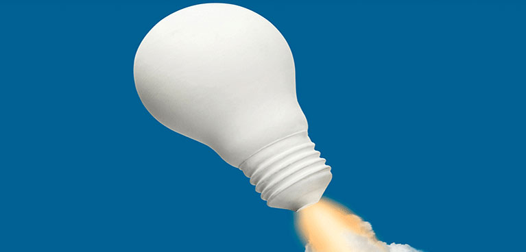 A light bulb taking off in the sky