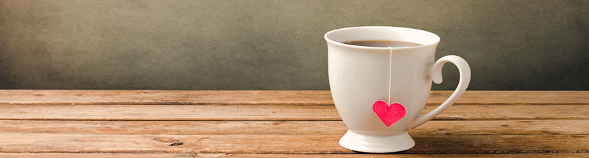 A cup of tea on a wooden table