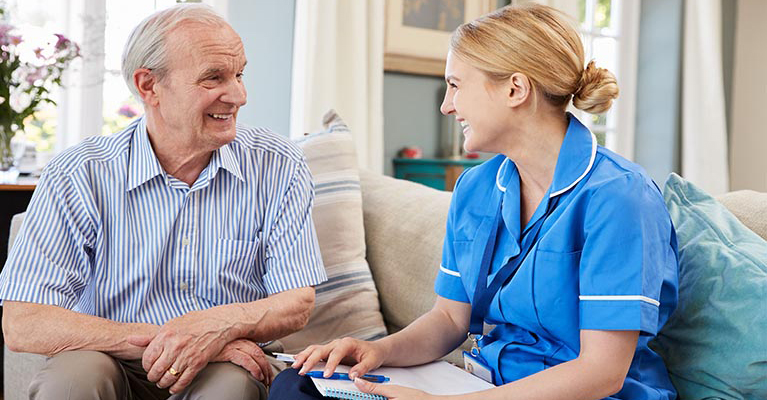 Nurse with elderly gentleman