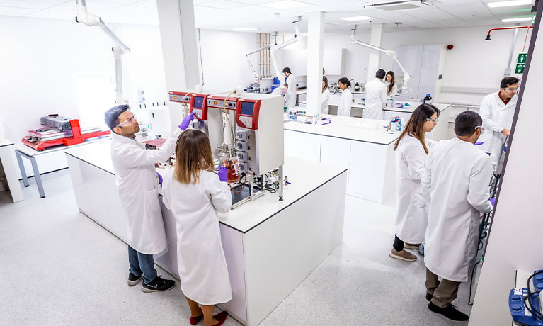 Researchers inside a AME laboratory