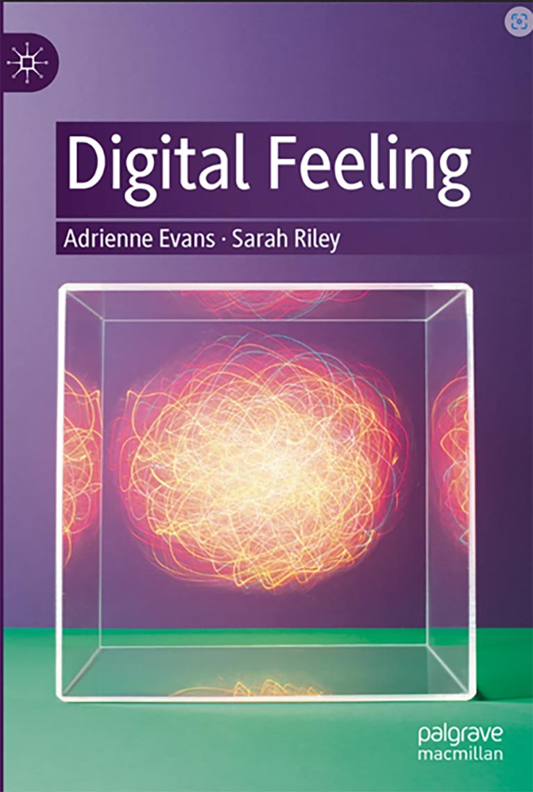 Digital Feeling by Adrienne Evans and Sarah Riley with transparent cube with atoms