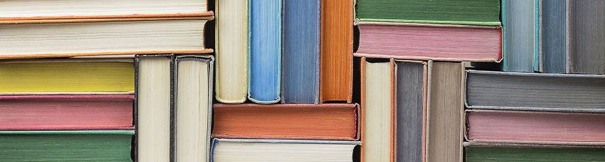 Colourful books stacked up