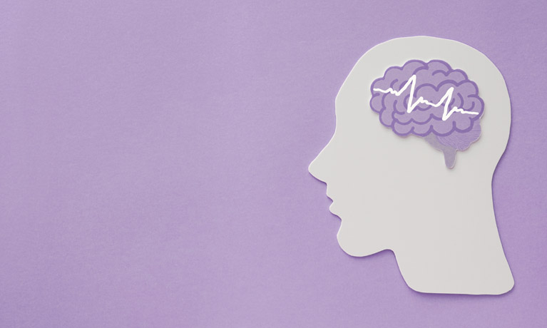 Abstract image of human brain with purple background