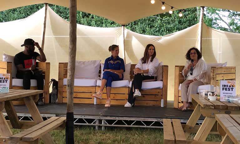 Huma Shah and three panel members sat in festival style gazebo