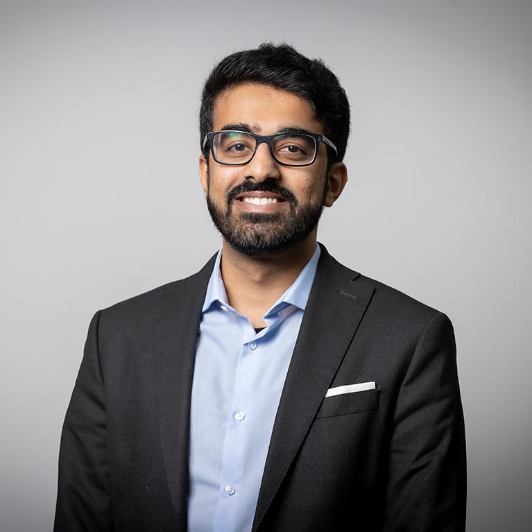 Amanvir Kalket smiling during photoshoot