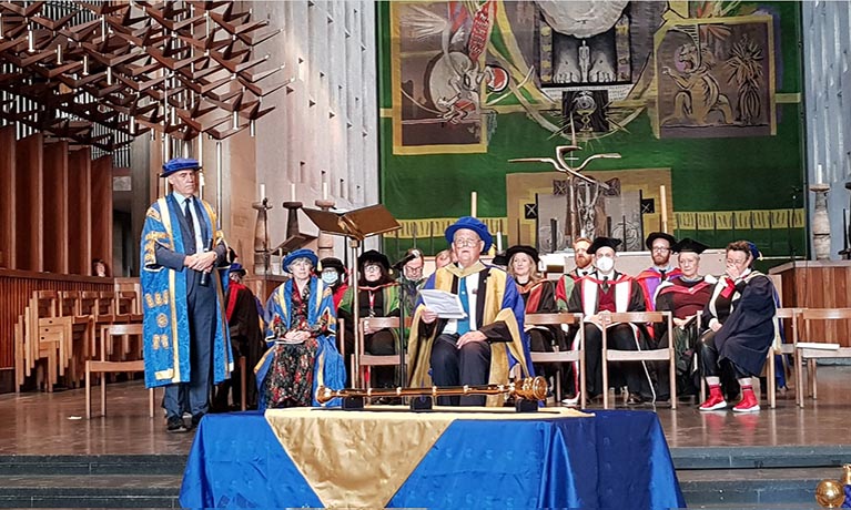 Bruce Kent receiving his honorary doctorate in Coventry Cathedral.