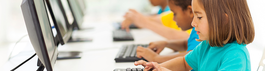 Children using computers in class