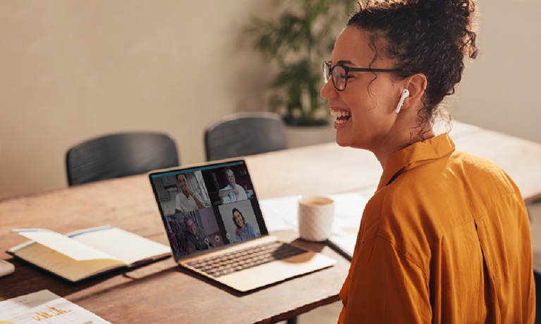 Girl smiling on a conference call