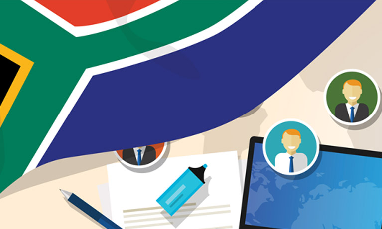 South Africa education and school concept with laptop and graduation hat