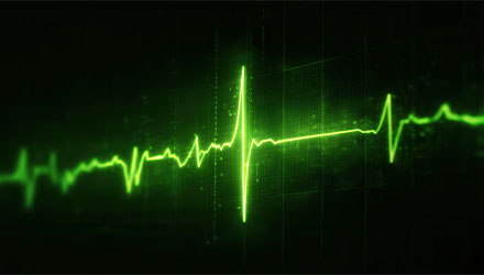 Neon  green heart rate monitor display against a black background