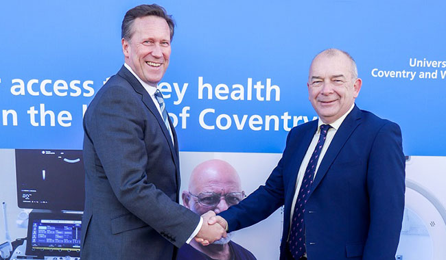 Professor Andy Hardy, Chief Executive at UHCW NHS Trust and Professor John Latham CBE, Vice-Chancellor of Coventry University Group