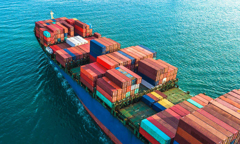 Container ship on a blue sea