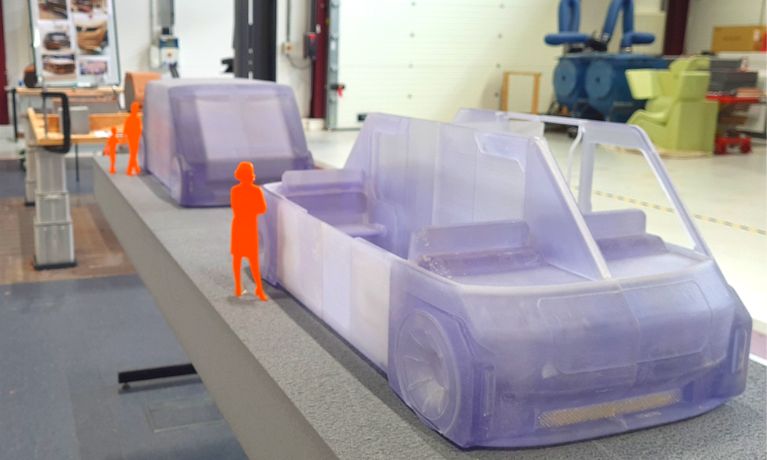 Close of of two small transport pods made out of a purple material.