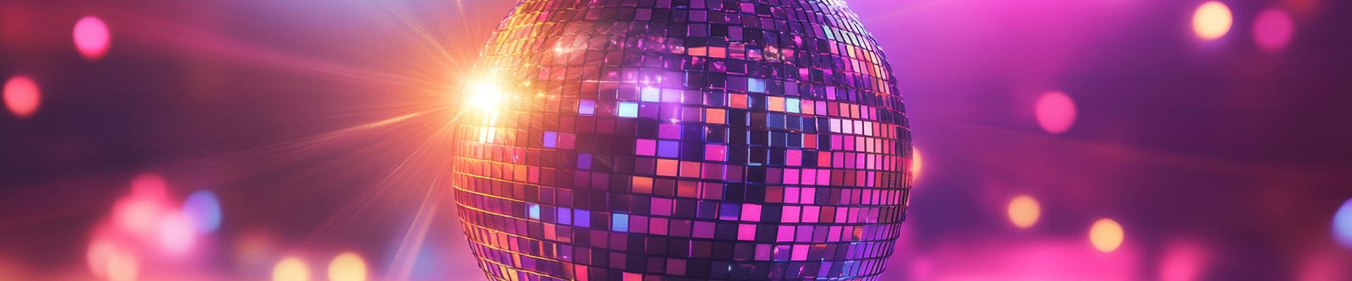 A disco ball with a colourful background with lights