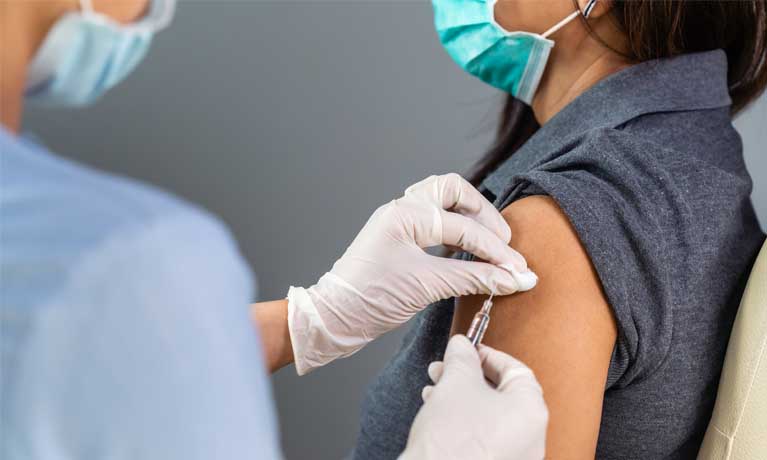 Woman getting an injection