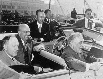 Henry J. Kaiser with Franklin D. Roosevelt in a car.