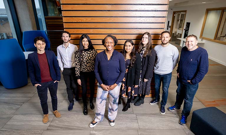 staff posing together