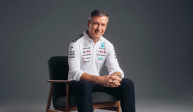 Rob Thomas wearing a Mercedes shirt 