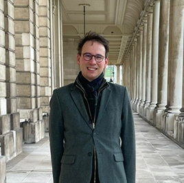 Michael Harratts smiling michael-harrats-profile-268x266.jpg