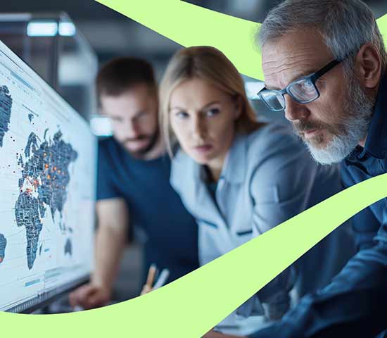 Professionals reviewing information on a digital map