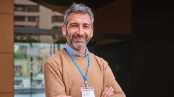 Older man with beard wearing 