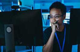 student looking at a monitor 