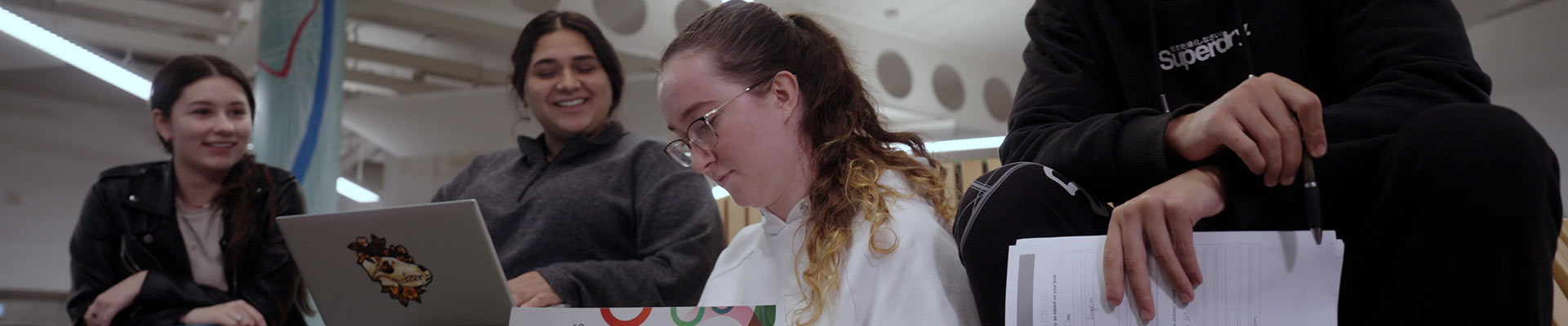 A group of students with their textbooks