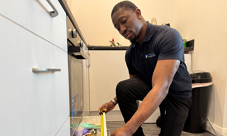 Kenny Aladenola working on a kitchen job