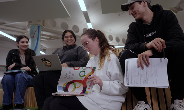 A group of students with their textbooks
