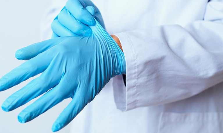 Plastic medical gloves